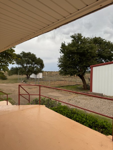 South view from porch toward the shop and grounds